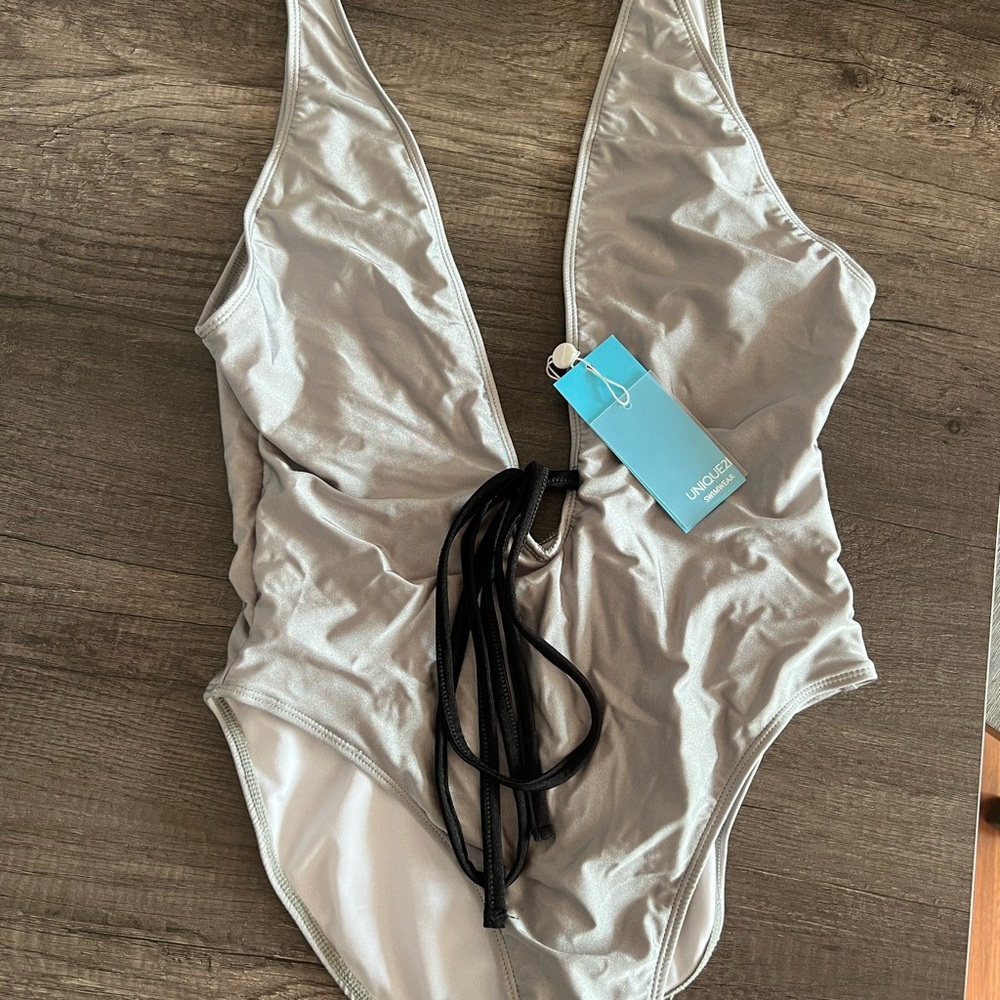Unique 21 Plunge Swimsuit One Piece